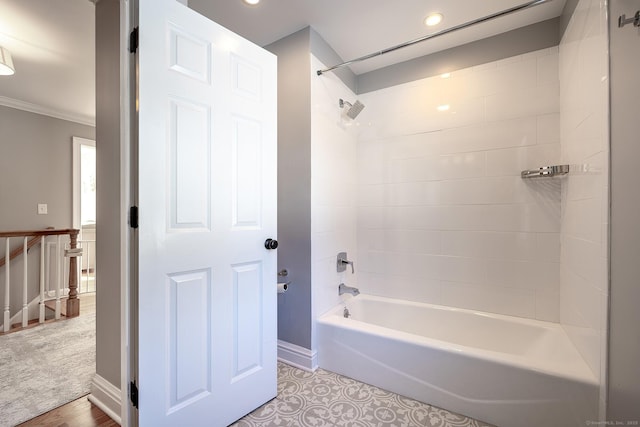 bathroom featuring shower / washtub combination, wood-type flooring, and crown molding