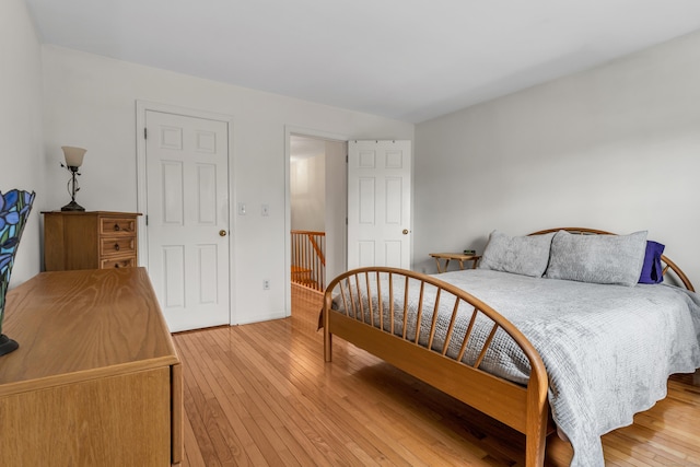 bedroom with light wood-type flooring