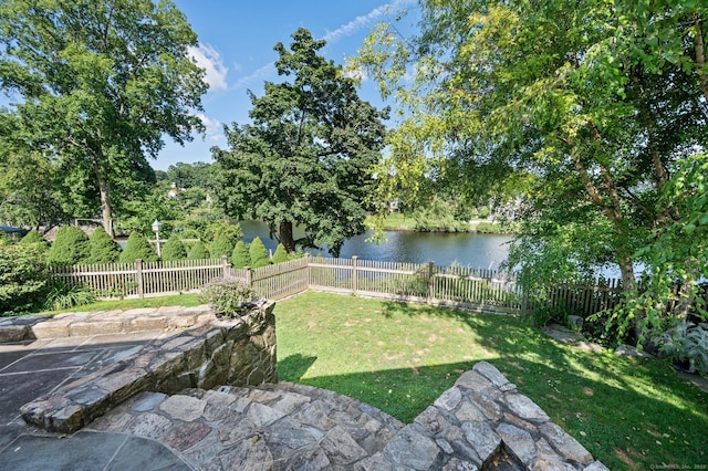 view of yard with a water view