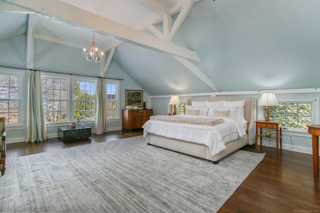 bedroom featuring dark hardwood / wood-style flooring, multiple windows, and a notable chandelier