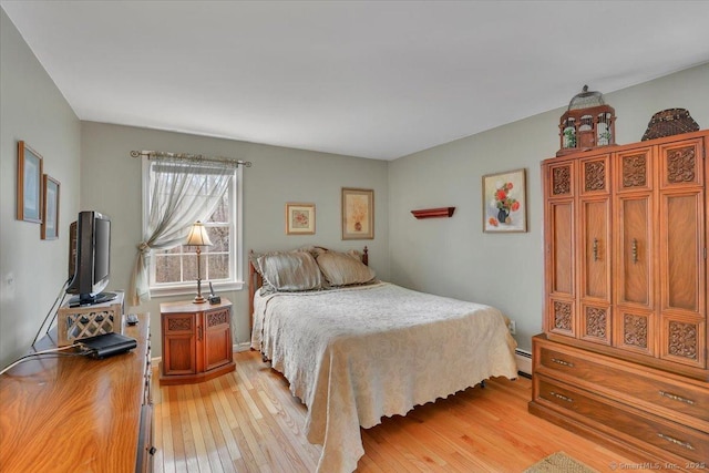 bedroom with light wood-style flooring