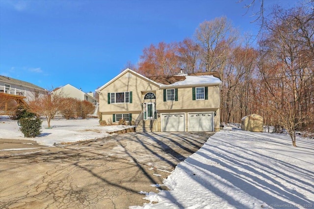 split foyer home featuring a garage