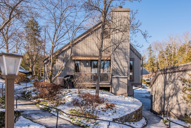 view of snow covered house