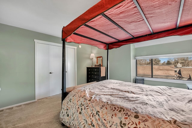 bedroom with light colored carpet