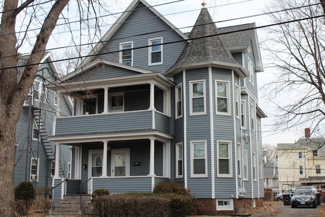 victorian-style house featuring covered porch