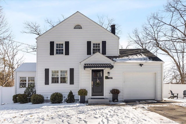 view of front of property featuring a garage