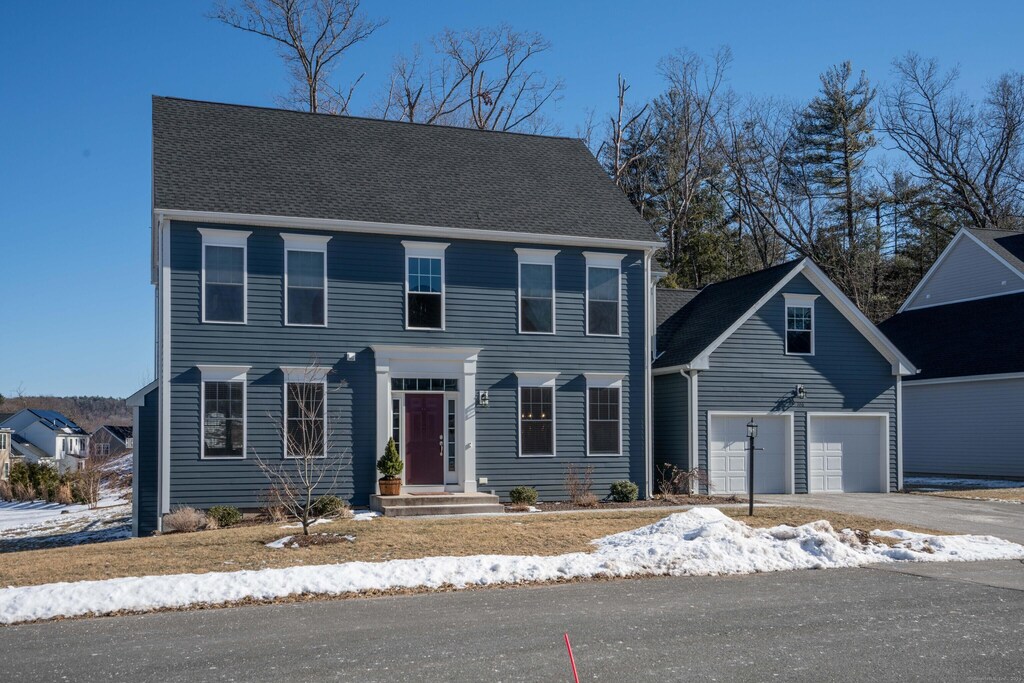 106 Cambridge Ct Unit 106, Simsbury, CT 06070 - colonial inspired home with aphalt driveway, roof with shingles, and a garage