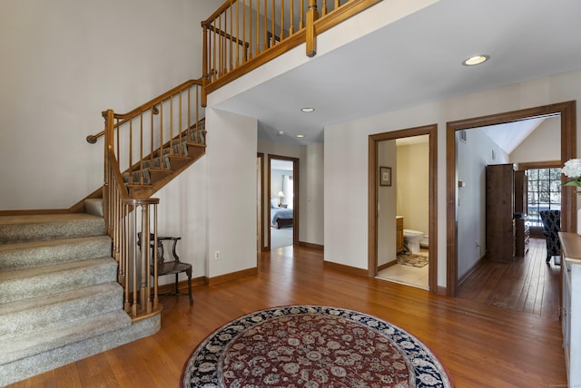 foyer with wood-type flooring