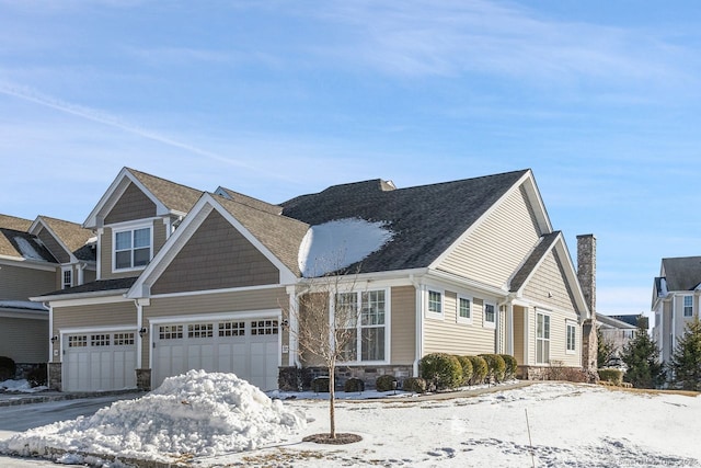 view of front of home with a garage