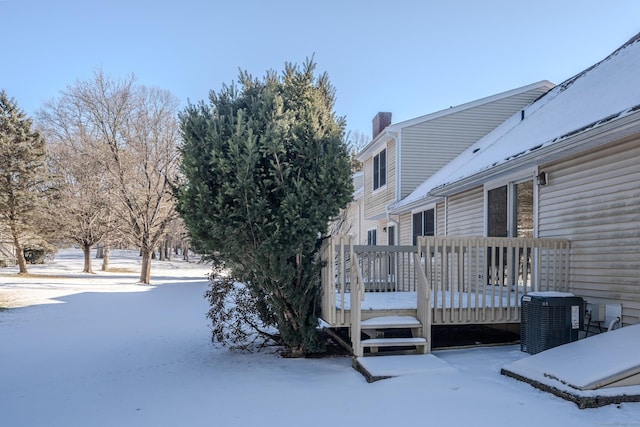 exterior space featuring central AC unit