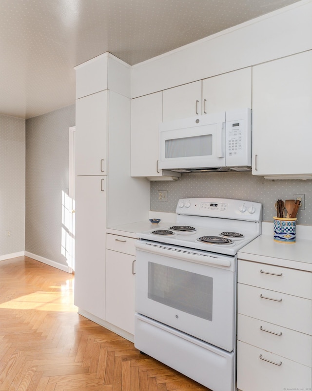 kitchen featuring white cabinetry, backsplash, white appliances, and light parquet floors