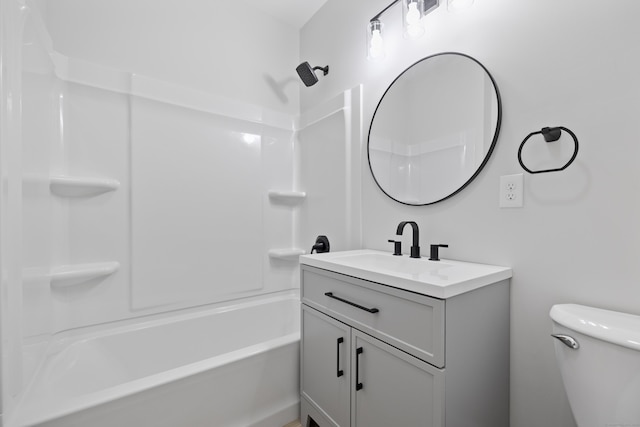 full bathroom with vanity, shower / washtub combination, and toilet