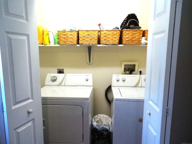 washroom featuring independent washer and dryer