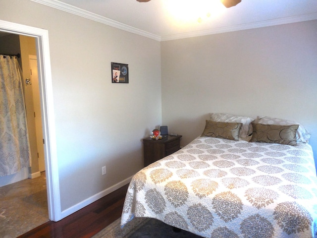 bedroom with hardwood / wood-style flooring, ceiling fan, and ornamental molding