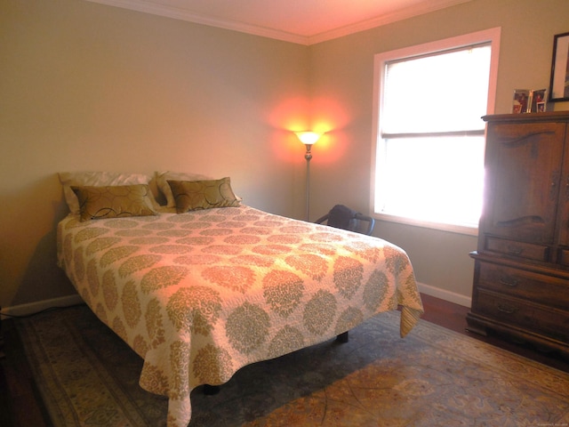 bedroom with crown molding