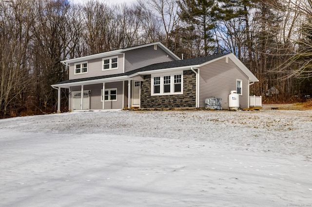 front of property with a garage