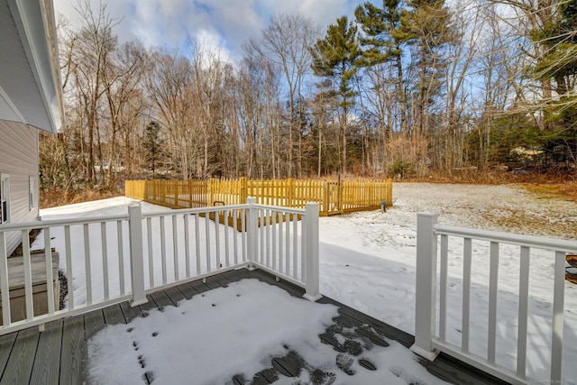 view of snow covered deck