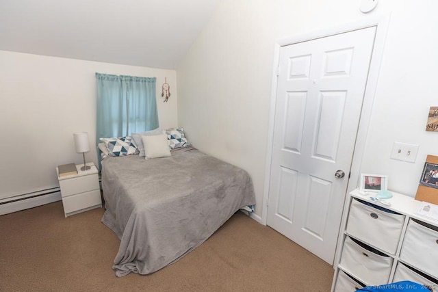 carpeted bedroom featuring vaulted ceiling and baseboard heating