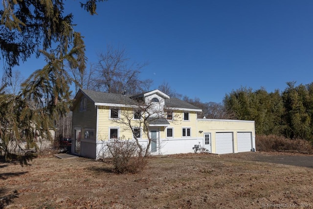 view of front of home featuring a garage