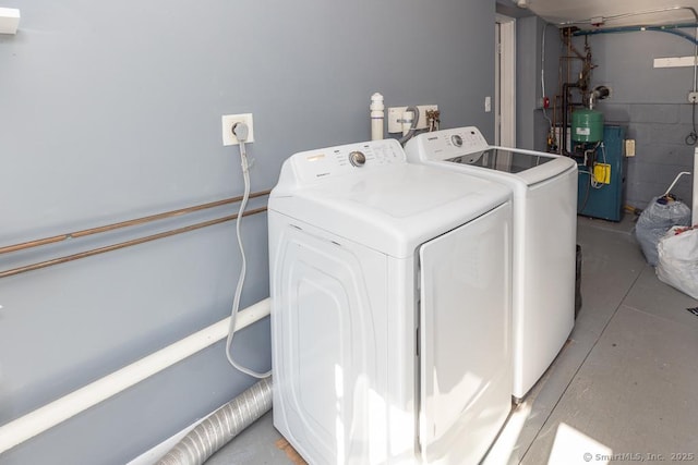 washroom featuring independent washer and dryer