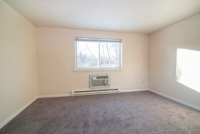 carpeted spare room with a baseboard heating unit and a wall mounted AC