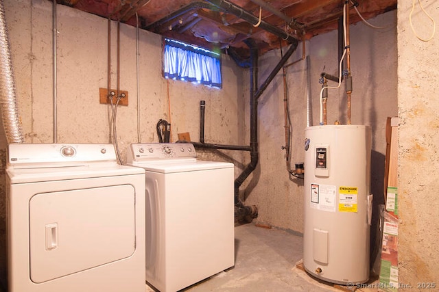 washroom featuring independent washer and dryer and electric water heater