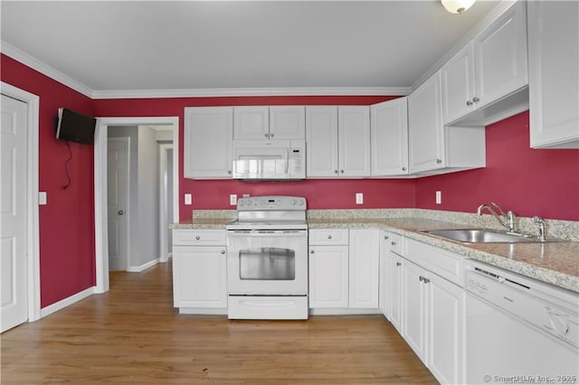 kitchen featuring white cabinetry, white appliances, light hardwood / wood-style floors, and crown molding