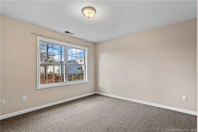 view of carpeted spare room