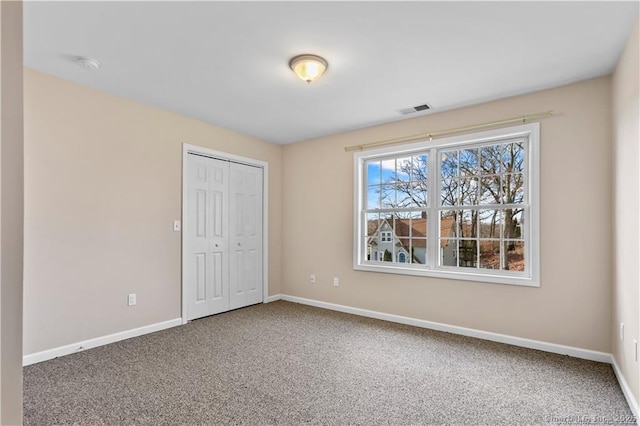 empty room with carpet floors