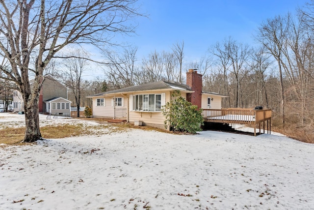 view of front of property with a deck