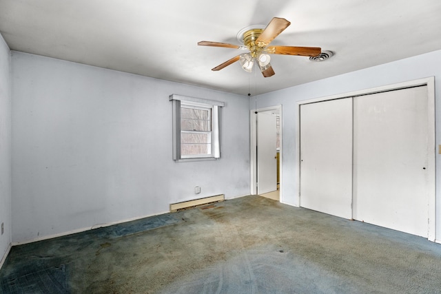 unfurnished bedroom featuring carpet flooring, ceiling fan, and baseboard heating