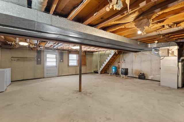 basement with washer and clothes dryer