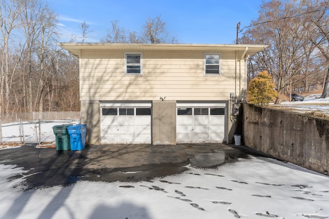 view of snow covered garage