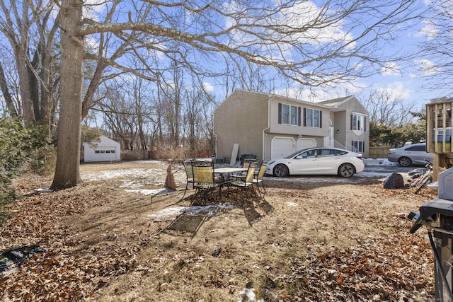 view of side of home featuring a garage