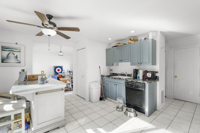 kitchen featuring sink, light tile patterned floors, dishwasher, and ceiling fan