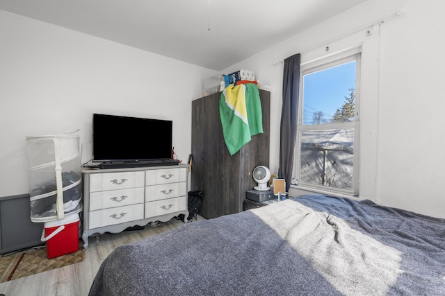 bedroom featuring hardwood / wood-style flooring