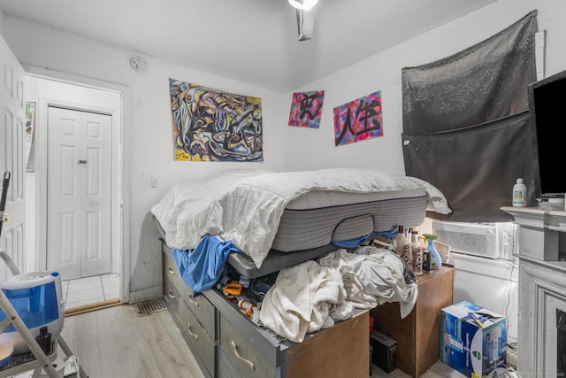 bedroom with light hardwood / wood-style flooring