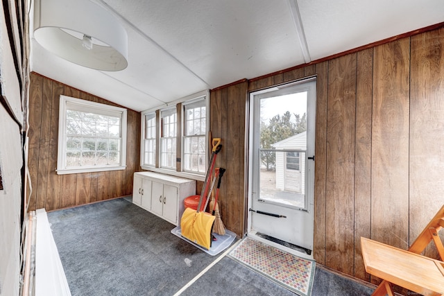 unfurnished sunroom with lofted ceiling