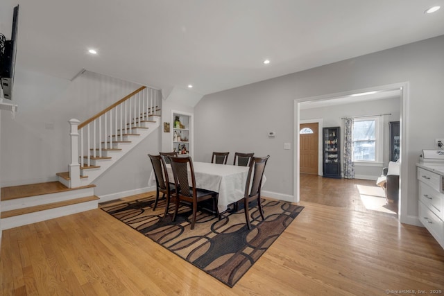 dining room with light hardwood / wood-style flooring