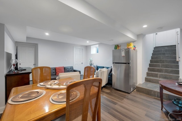 dining area featuring wood-type flooring