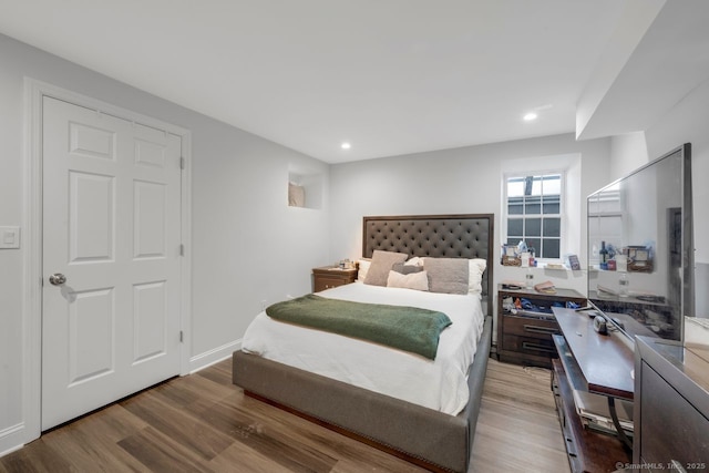 bedroom featuring hardwood / wood-style floors