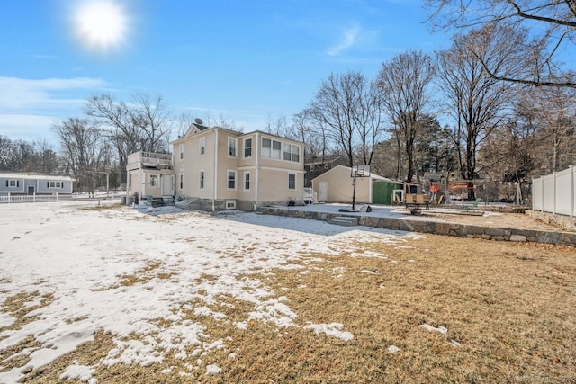 view of snow covered house