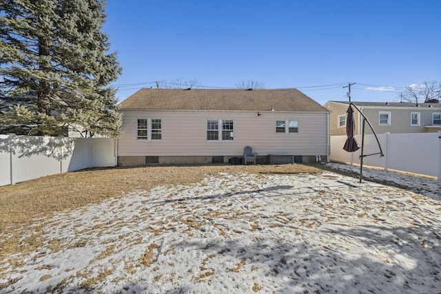 view of snow covered house