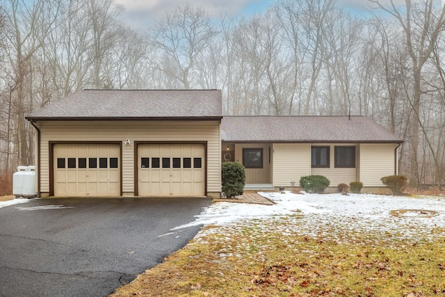 ranch-style house with a garage