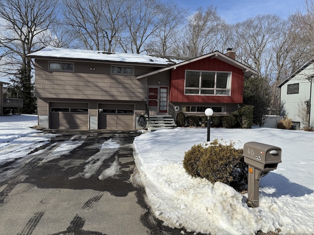 raised ranch featuring a garage