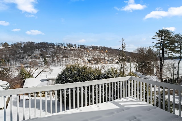 view of snow covered deck