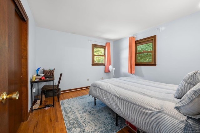 bedroom featuring hardwood / wood-style floors