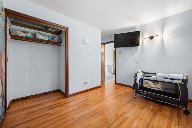 bedroom featuring light wood-type flooring