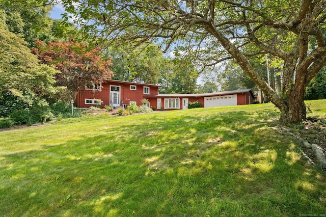 view of yard with a garage