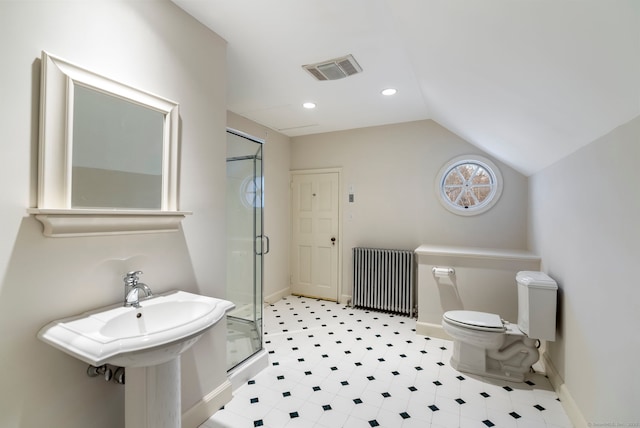 bathroom with lofted ceiling, radiator, sink, an enclosed shower, and toilet